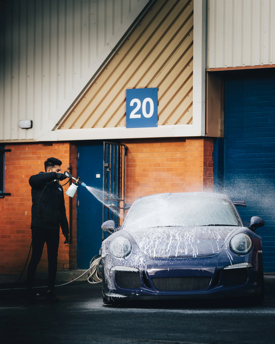Shaanshine team detailing car in Perth driveway